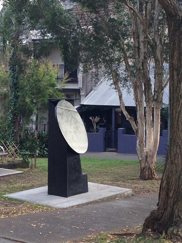 Kevin Norton, Kimono. Windsor Street, Paddington. English born artist Kevin Norton captures the idea of the Japanese kimono in this abstract stainless steel sculpture.