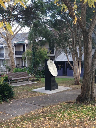 Kevin Norton, Kimono. Windsor Street, Paddington. English born artist Kevin Norton captures the idea of the Japanese kimono in this abstract stainless steel sculpture.