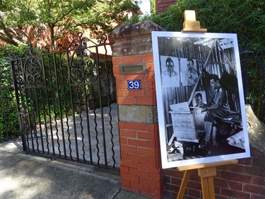 Gatepost of 39 Etham Avenue, Darling Point, with an image of Douglas Watson, Official War Artist WW2