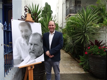 Asher Morris, Alan's son, with his father's portrait