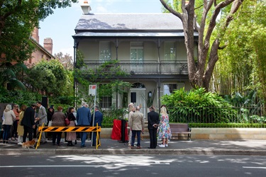 Guests at the plaque unveiling