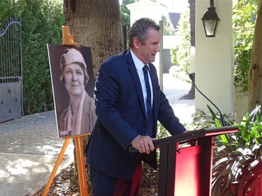 Judge Sandy Street speaking at plaque unveiling for Jessie Street