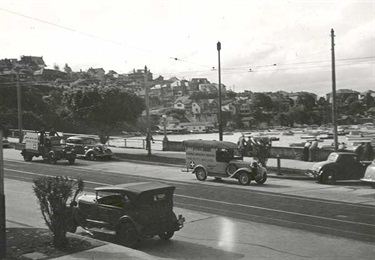 Woollahra Council in conjunction with the Royal Motor Yacht Club, carry out a National Emergency Services drill in September, 1940. Ambulances pictured in New South Head Road, Rose Bay