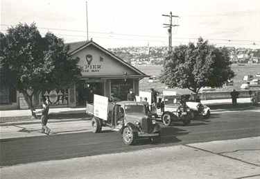Woollahra Council in conjunction with the Royal Motor Yacht Club, carry out a National Emergency Services drill in September, 1940. Service vehicles pictured outside The Pier, Rose Bay.