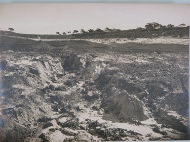 The steep terrain compounded problems already posed by the sandy soil - easily subject to wash-away and collapse. Handwritten on reverse: ‘washaway’.  One of a series of photographs  taken of the construction of Birriga, Bundarra and Banksia Roads, and Benelong Crescent, formed as part of the Bellevue Hill Bondi Estate, a subdivision of the Point Piper Estate.  Woollahra Libraries Digital Archive PF004648d