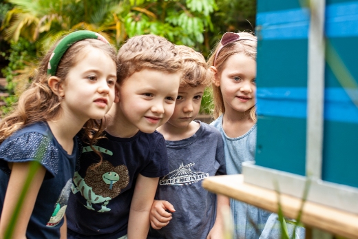 Kids with native bee hive