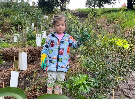 Girl at tree planting