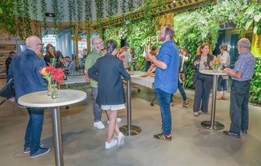 Judges, nominees and guests enjoy refreshments.