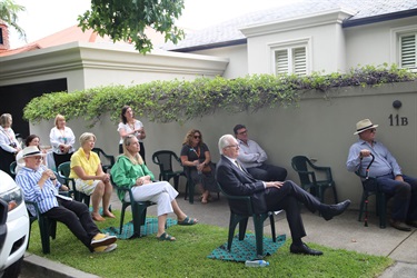 Guests at the unveiling of a plaque for Sir Mungo William MacCallum KCMG.