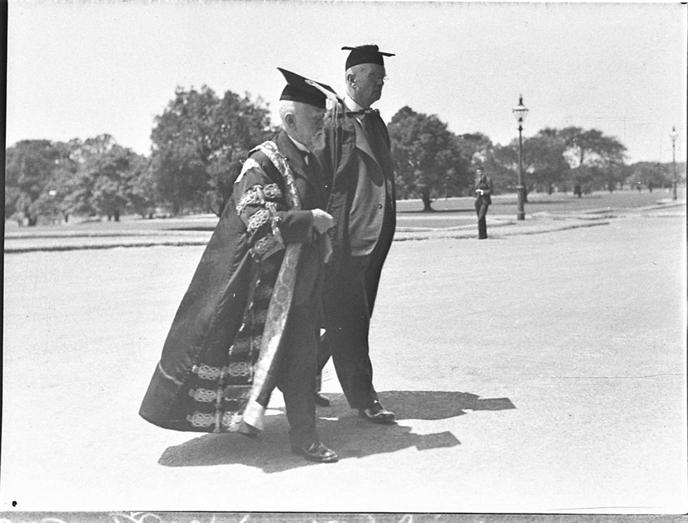 The Chancellor Sir Mungo MacCallum (on left) and Dr Arthur Mills, former Dean of the Faculty of Medicine, on their way to attend the Armistice Day service in the Great Hall on 11 November 1936. Hood Collection, Mitchell Pictures, State Library of NSW