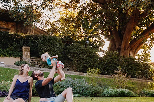 Family enjoying picnic in Blackburn Gardens