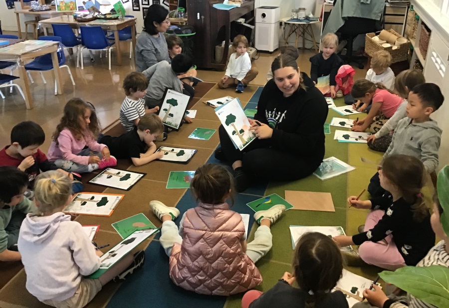 a person teaching children in a classroom