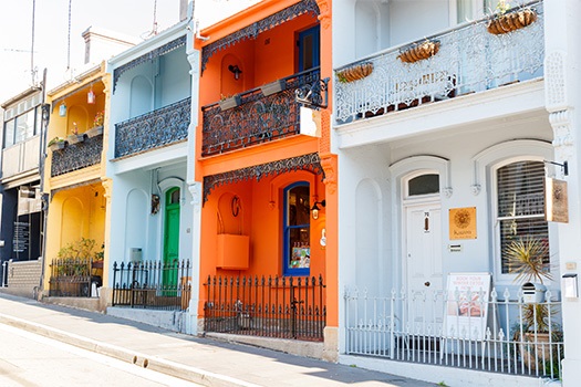 Street with brightly coloured terrace houses