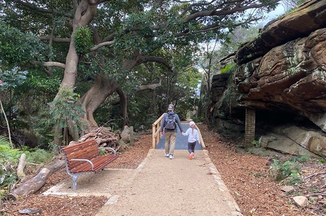 Father and daughter walking along the new historic pathway