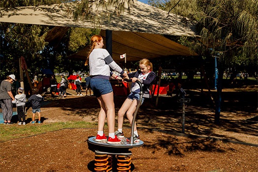 Two girls on spinner
